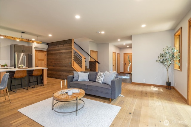 7489 Olsen Dr, Deming, WA 98244 - living room featuring stairway, light wood finished floors, and recessed lighting