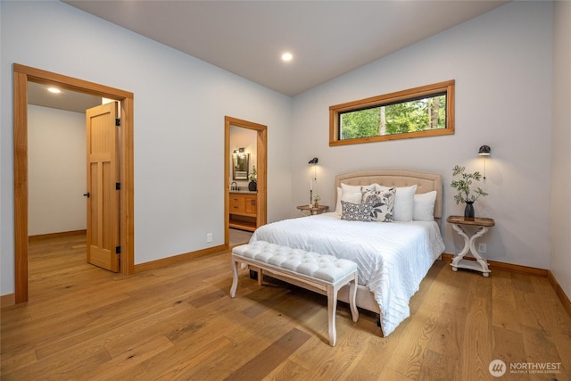 7489 Olsen Dr, Deming, WA 98244 - bedroom featuring light wood finished floors, recessed lighting, and ensuite bathroom