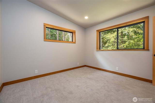 7489 Olsen Dr, Deming, WA 98244 - empty room featuring vaulted ceiling, recessed lighting, and carpet floors
