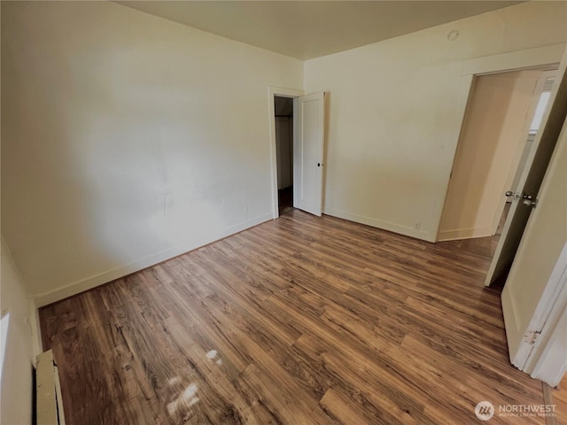 552 Maple St S, Okanogan, WA 98844 - spare room with wood finished floors