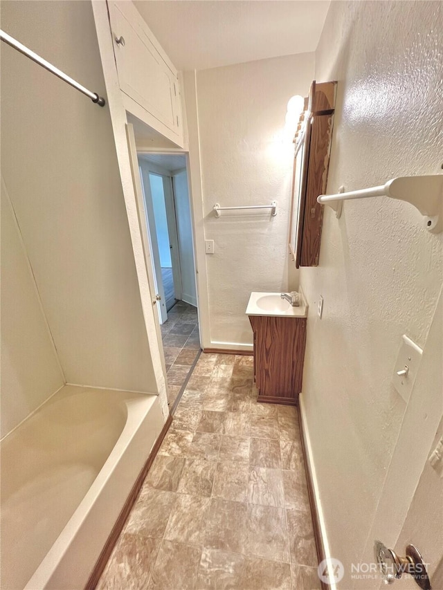 552 Maple St S, Okanogan, WA 98844 - bathroom with vanity and baseboards