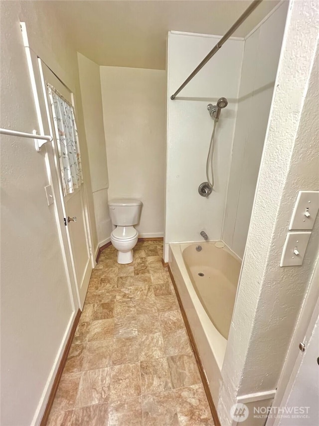 552 Maple St S, Okanogan, WA 98844 - bathroom featuring stone finish flooring and bathtub / shower combination