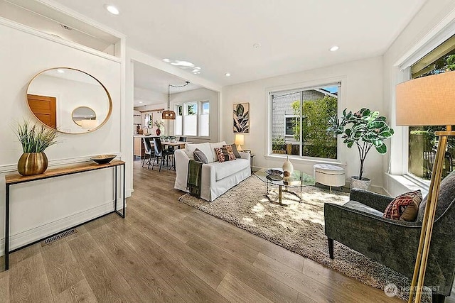8608 12th Ave SW, Seattle, WA 98106 - living room with wood finished floors and recessed lighting