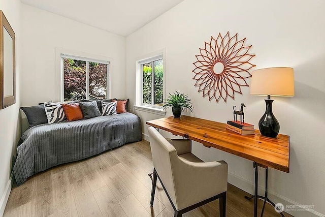 8608 12th Ave SW, Seattle, WA 98106 - bedroom featuring wood finished floors and baseboards