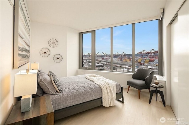 590 1st Ave S Unit 907, Seattle, WA 98104 - bedroom with wood finished floors