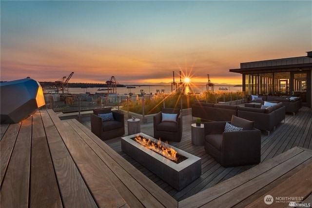590 1st Ave S Unit 907, Seattle, WA 98104 - wooden terrace with an outdoor living space with a fire pit