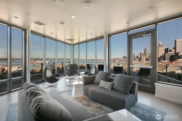 590 1st Ave S Unit 907, Seattle, WA 98104 - living area with expansive windows and a view of skyline