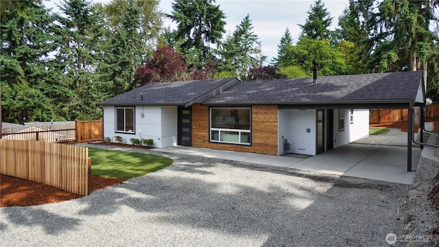 840 SW 306th St, Federal Way, WA 98023 - view of front of house with an attached carport, driveway, and a shingled roof