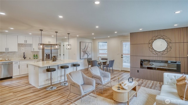 840 SW 306th St, Federal Way, WA 98023 - living area featuring light wood-type flooring and recessed lighting