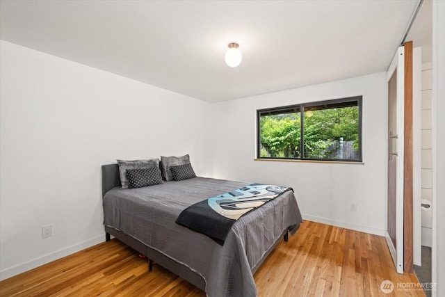 6024 Gould Ave S, Seattle, WA 98108 - bedroom with light wood-type flooring