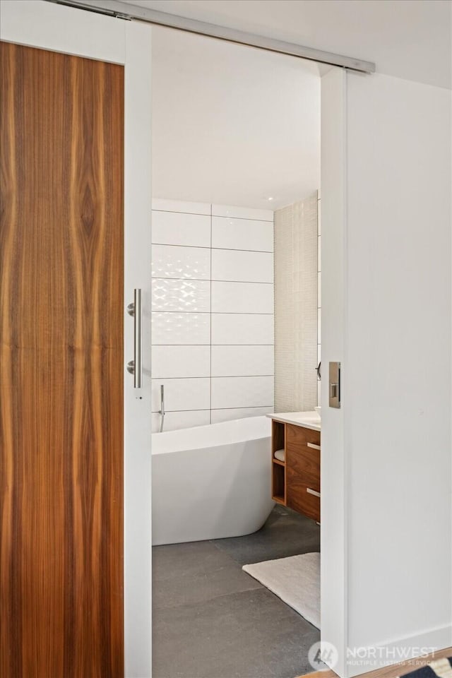 6024 Gould Ave S, Seattle, WA 98108 - bathroom with vanity and a soaking tub