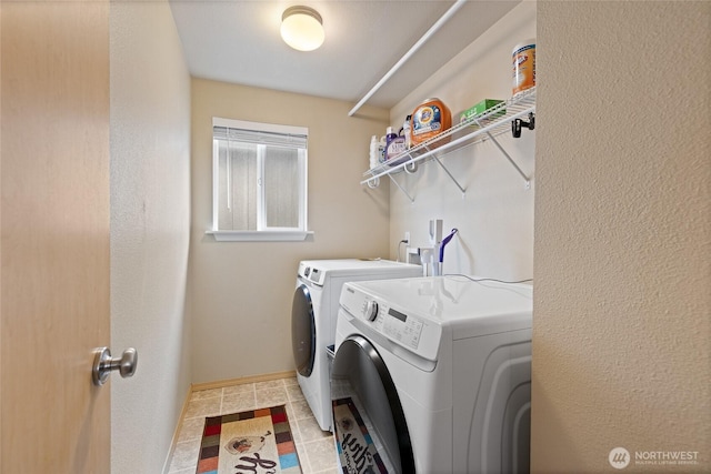 7230 178th St E, Puyallup, WA 98375 - laundry room with washer and clothes dryer and baseboards