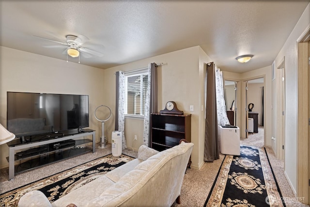7230 178th St E, Puyallup, WA 98375 - living room with ceiling fan, light carpet, and a textured ceiling