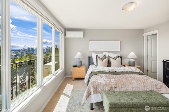 1818 Bigelow Ave N Unit 403, Seattle, WA 98109 - bedroom featuring a wall mounted AC, light colored carpet, and a city view