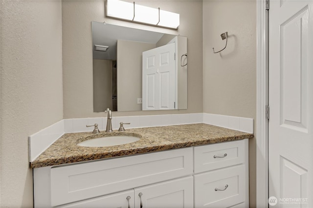 3005 Old Morse Rd SE, Olympia, WA 98501 - bathroom with vanity and a textured wall