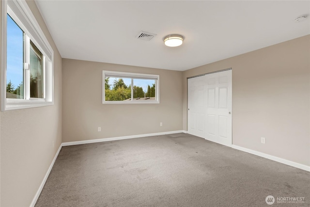 3005 Old Morse Rd SE, Olympia, WA 98501 - unfurnished bedroom featuring carpet and a closet