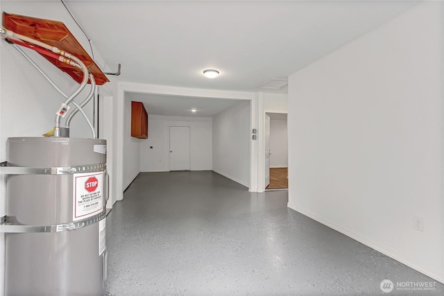 3005 Old Morse Rd SE, Olympia, WA 98501 - garage featuring strapped water heater and baseboards
