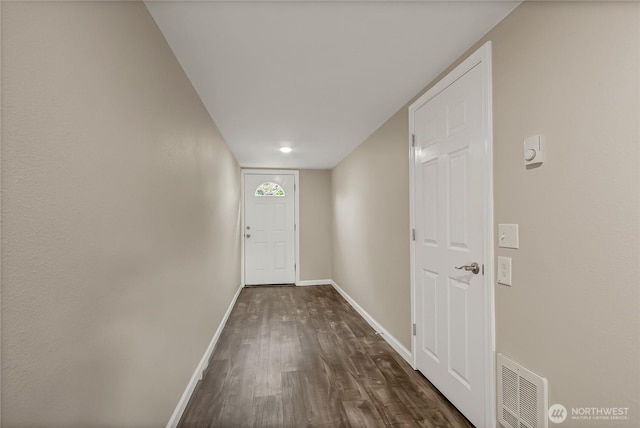 3005 Old Morse Rd SE, Olympia, WA 98501 - entryway with baseboards and dark wood finished floors
