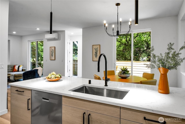 629A W Emerson Ave, Seattle, WA 98119 - kitchen featuring stainless steel dishwasher, a wall unit AC, light stone counters, decorative light fixtures, and recessed lighting