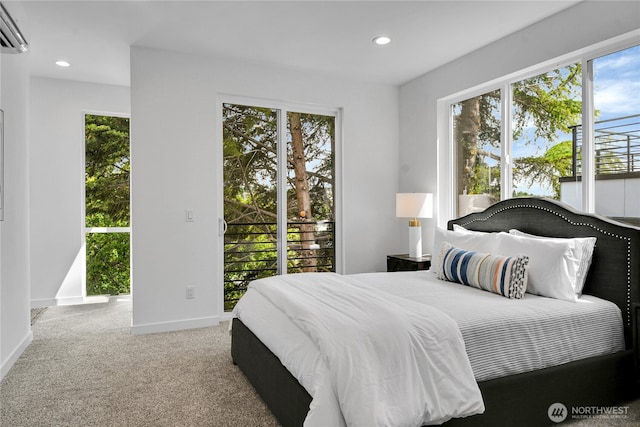 629A W Emerson Ave, Seattle, WA 98119 - bedroom featuring access to exterior, a wall unit AC, recessed lighting, and carpet