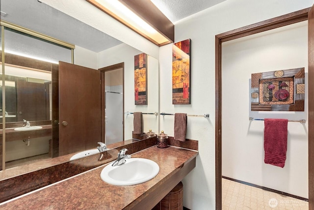 11300 1st Ave NE Unit 224, Seattle, WA 98125 - full bathroom featuring baseboards and vanity