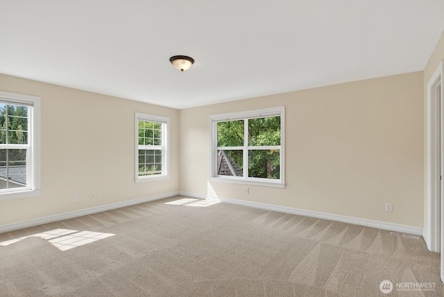 2414 42nd Pl, Anacortes, WA 98221 - unfurnished room featuring baseboards and light colored carpet