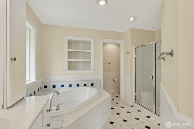 2414 42nd Pl, Anacortes, WA 98221 - bathroom with a stall shower, a bath, and wainscoting