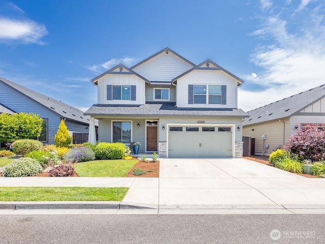 11217 NE 134th Pl, Vancouver, WA 98682 - craftsman-style house featuring driveway, an attached garage, and stone siding