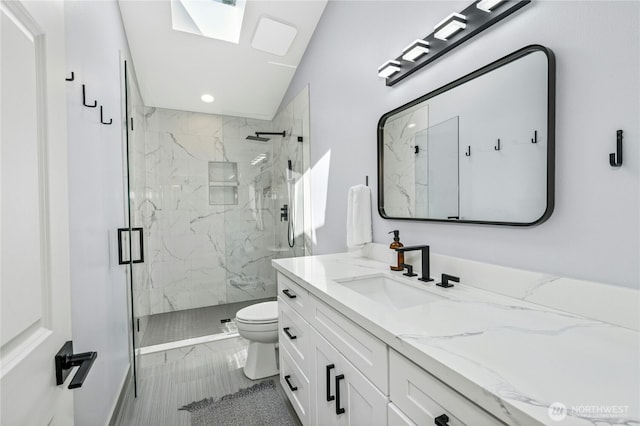 17519 33rd Ave NE, Lake Forest Park, WA 98155 - bathroom featuring a marble finish shower, vanity, vaulted ceiling, and recessed lighting