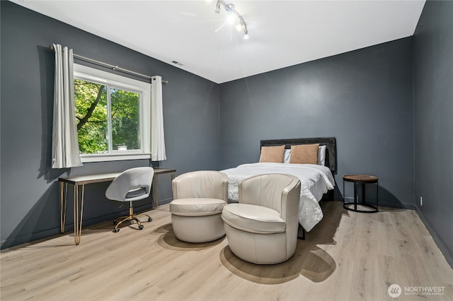 17519 33rd Ave NE, Lake Forest Park, WA 98155 - bedroom with wood finished floors, track lighting, and a desk