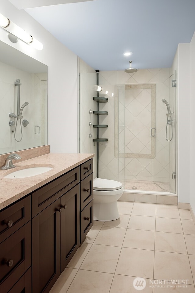 745 Bellevue Ave E Unit 109, Seattle, WA 98102 - bathroom with tile patterned flooring, vanity, and a stall shower
