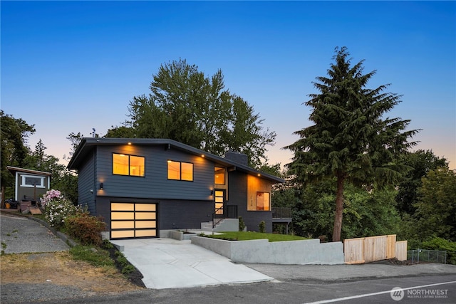 11029 84th Ave S, Seattle, WA 98178 - modern home featuring driveway and a garage