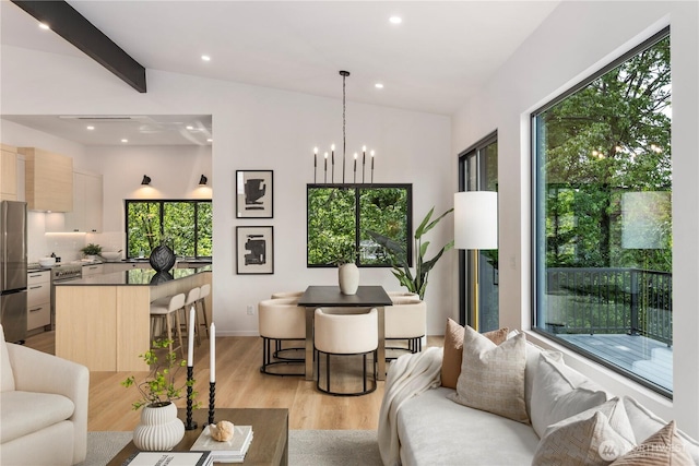 11029 84th Ave S, Seattle, WA 98178 - living area with light wood-type flooring, recessed lighting, and a chandelier