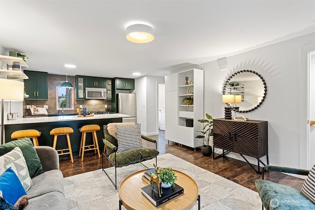 1541 18th Ave S, Seattle, WA 98144 - living room with dark wood-style floors and recessed lighting