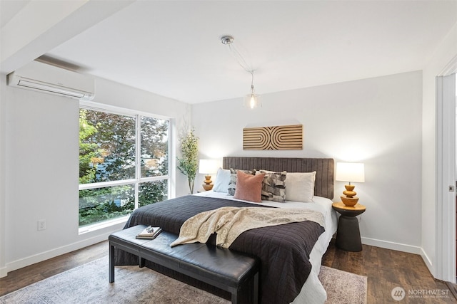 1541 18th Ave S, Seattle, WA 98144 - bedroom featuring a wall mounted AC, multiple windows, and wood finished floors