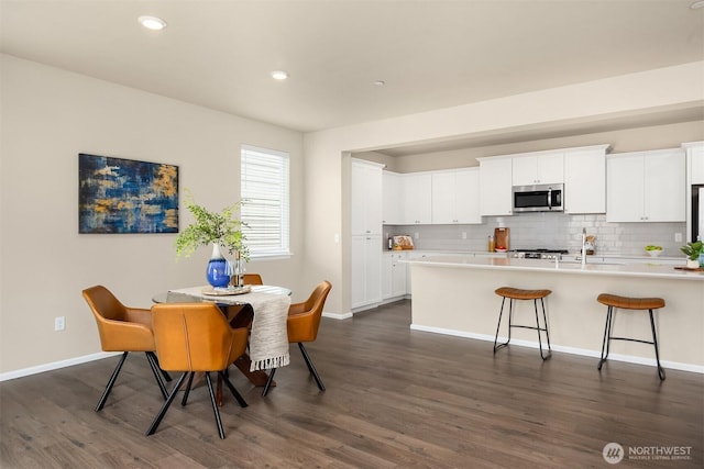 1312 Baker Heights Loop, Bremerton, WA 98312 - dining room featuring dark wood finished floors and recessed lighting