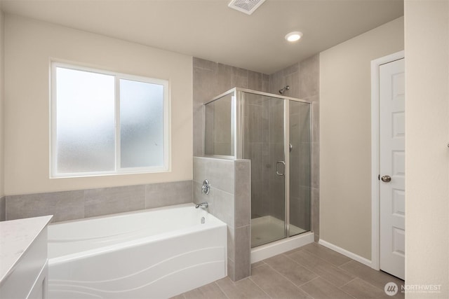 1312 Baker Heights Loop, Bremerton, WA 98312 - full bath featuring a bath, a stall shower, tile patterned floors, vanity, and recessed lighting