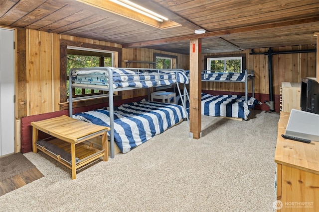 7 Moonshine Ln, Ronald, WA 98940 - bedroom with wood ceiling, wooden walls, and carpet floors