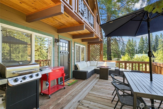 7 Moonshine Ln, Ronald, WA 98940 - wooden deck featuring grilling area, an outdoor living space with a fire pit, and outdoor dining area
