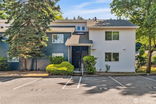 12608 NE 119th St Unit B8, Kirkland, WA 98034 - view of building exterior with uncovered parking