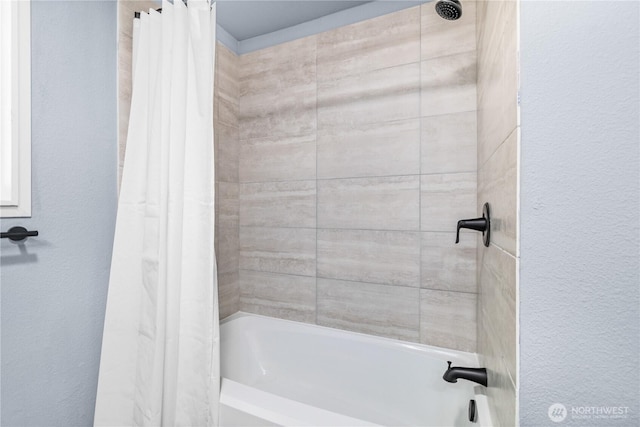 12608 NE 119th St Unit B8, Kirkland, WA 98034 - bathroom with shower / bathtub combination with curtain and a textured wall