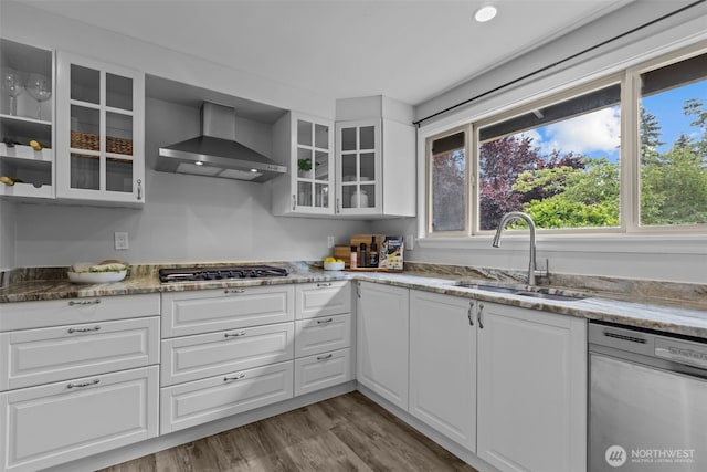 13002 145th St E, Puyallup, WA 98374 - kitchen with appliances with stainless steel finishes, wall chimney exhaust hood, white cabinets, glass insert cabinets, and recessed lighting