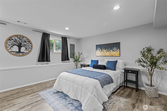 13002 145th St E, Puyallup, WA 98374 - bedroom with wood finished floors and recessed lighting