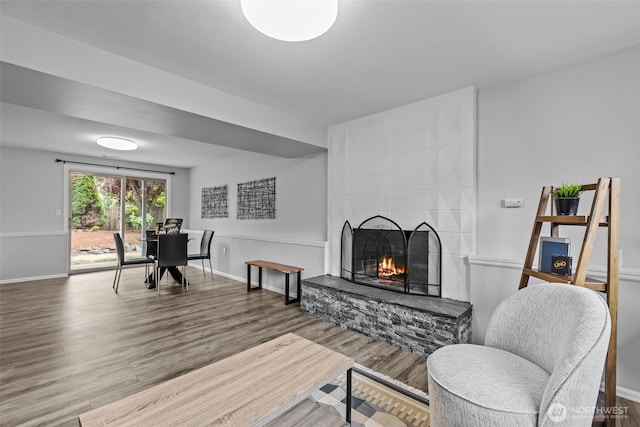 13002 145th St E, Puyallup, WA 98374 - living room featuring wood finished floors and a fireplace