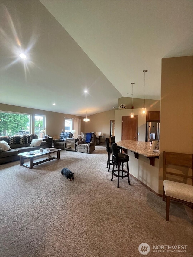 1717 Krause Rd, Raymond, WA 98577 - carpeted living area with vaulted ceiling and recessed lighting