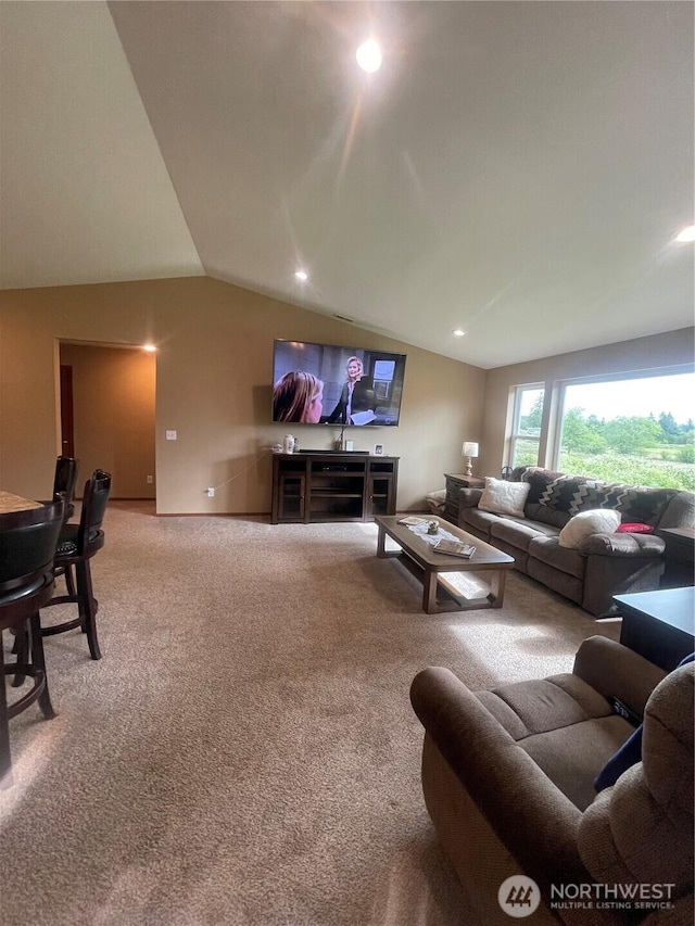 1717 Krause Rd, Raymond, WA 98577 - living area with vaulted ceiling, carpet flooring, and recessed lighting