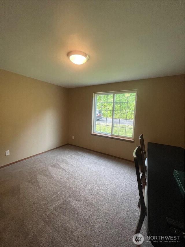 1717 Krause Rd, Raymond, WA 98577 - unfurnished office with carpet flooring and baseboards