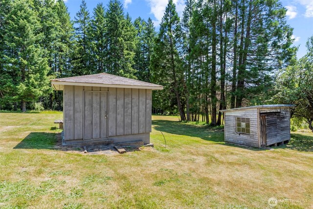 106 Barba Rd, Castle Rock, WA 98611 - view of green lawn with a shed