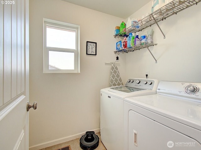 1706 NW 17th St, Battle Ground, WA 98604 - laundry room with washer and dryer and light tile patterned floors
