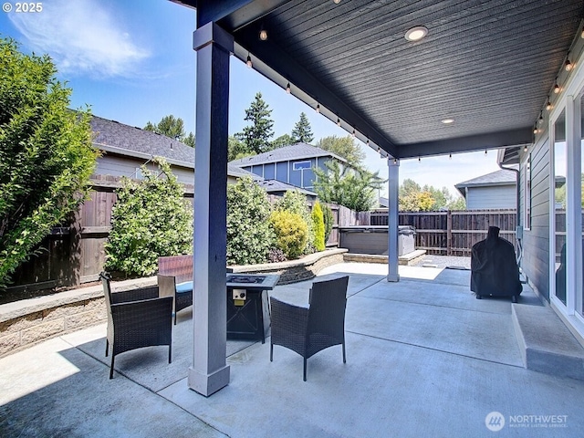 1706 NW 17th St, Battle Ground, WA 98604 - fenced backyard featuring a hot tub, a patio, and an outdoor fire pit